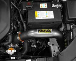 Engine bay shot AEM Cold Air Intake for 2014 Kia Soul models equipped with the 2.0L NU MPI engine