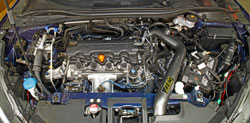 Closeup of an AEM 21-800C Cold Air Intake installed on a 2016 Honda HR-V