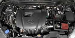 The AEM 21-804C air intake is designed to replace the factory air filter and intake housing.