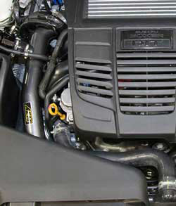 An AEM intercooler charge pipe stabilizes air pressure to pull more power from the WRX FA20F 2.0L  