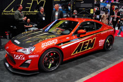 The FRS in the AEM booth at SEMA has a number of aftermarket modificatons to give it a custom look