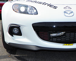 The AEM Cold Air Intake for 2010-2014 Mazda MX-5 Miata 2.0L models places the AEM CAI air filter in front of the radiator