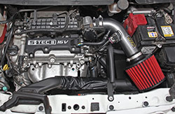 Engine bay picture of AEM cold air intake 21-766C installed into 2013, 2014, and 2015 Chevrolet Spark 1.2L or Chevy Spark