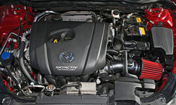 AEM 21-779C cold air intake installed into engine bay of Mazda 6 2.5L 4-cylinder