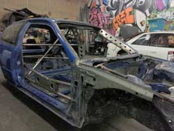 The drift-style inspired cage was the first thing Brian Camacho completed on his bare frame Honda