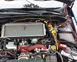 As part of the cold air intake development process AEM uses thermocouples and ECU scanning tools to monitor temperatures along the inlet path, under the hood, and outside of the vehicle