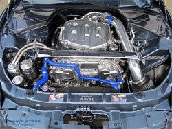Polished engine parts compliment the AEM Dryflow air filter, as well as other components in the engine bay