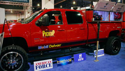 SEMA Showcased 4x4 GMC Sierra 3500 HD with 4-6" Adjustable Lift Kit and Electric Winches Mounted on Front and Back Bumpers 