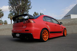 Peter Ruza installed an AEM cold air intake system on his 2008 Mitsubishi Lancer Evo X for improved engine performance.