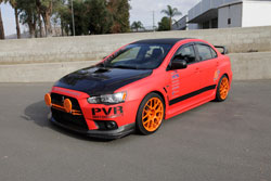 PVR Motorsports' Radiator cover and intake scoop are installed on this 2008 Mitsubishi Lancer Evo X and was on display at SEMA