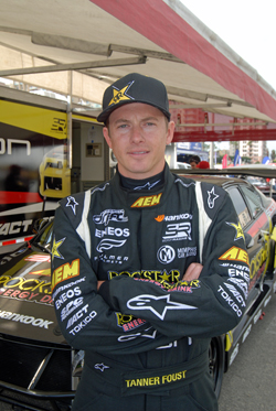 Tanner Foust standing in front of his Scion tC after qualifying at FormulaD's Streets of Long Beach event