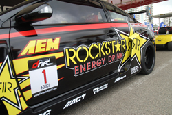 The side of Tanner Foust's TRD V8-powered Scion tC sporting the Number 1 competitor plate for the 2009 FormulaD season